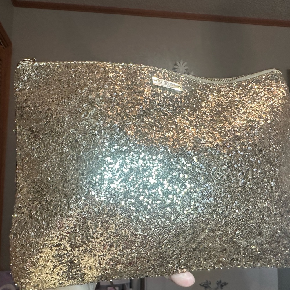 April BUYER Appreciation Kate Spade Glitter Clutch Storybook Lining